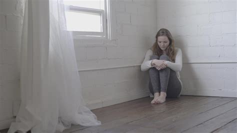 Sad Girl Sitting In Corner – Filmpac