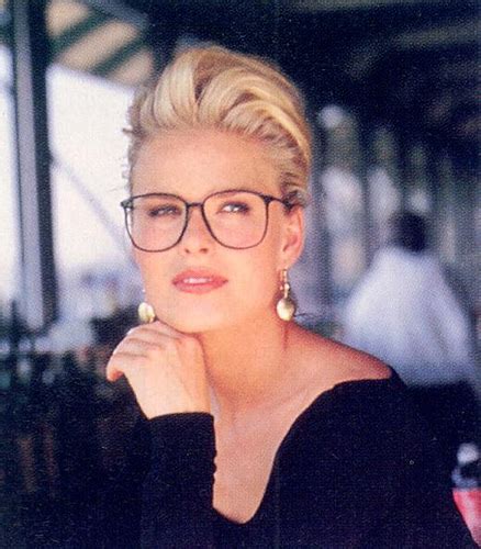 kim basinger wearing some sexy oversized glasses a photo