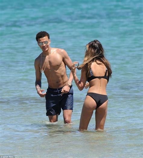 dele alli embraces model ruby mae as they holiday in ibiza daily mail online