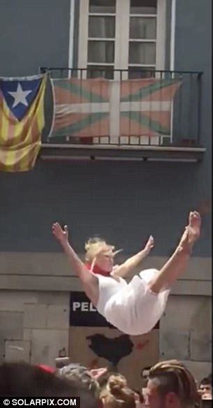 topless woman jumps in the name of tradition in pamplona daily mail