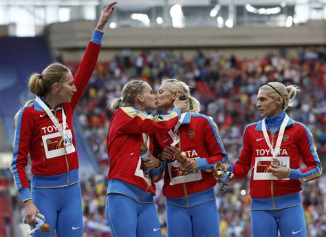 russian athlete denies podium kiss was meant to back gay rights toronto star