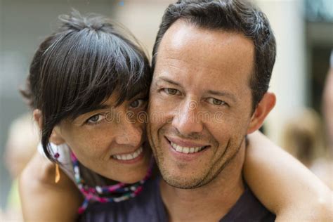 Portrait Of Beautiful Couple Man And Woman In Basic Clothing Smiling