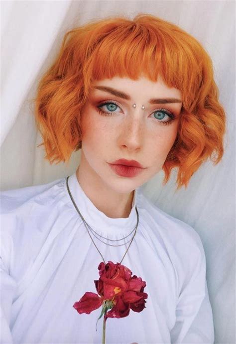 Più di 20 foto ispirazionali sulla nuova tendenza colore capelli arancio che infuocherà la primavera 2020. Capelli arancioni: come scegliere la giusta tonalitÃ  e a chi stanno