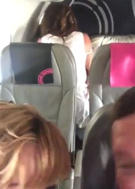 couple caught having steamy romp on plane while in their seats
