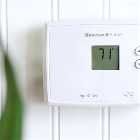 honeywell home rthb  volt electronic  programmable thermostat    programmable