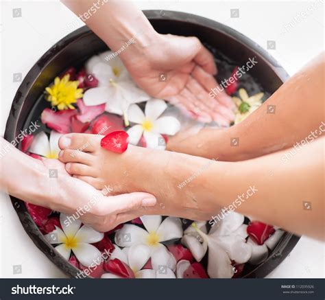 spa foot massage stock photo  shutterstock