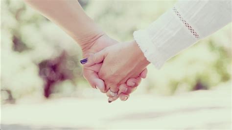 Couple Holding Hands Close Up In Blur Background Hd Couple Wallpapers