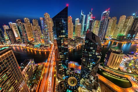 city cityscape night dubai united arab emirates water architecture building modern