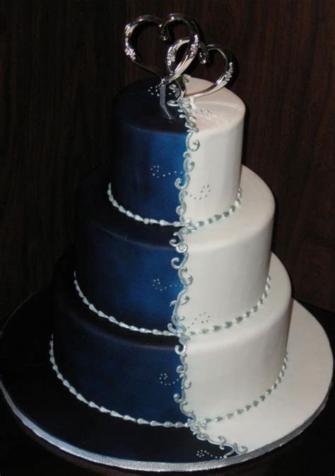 a beautiful sweet sixteen cake or quinceañera cake blue silver and