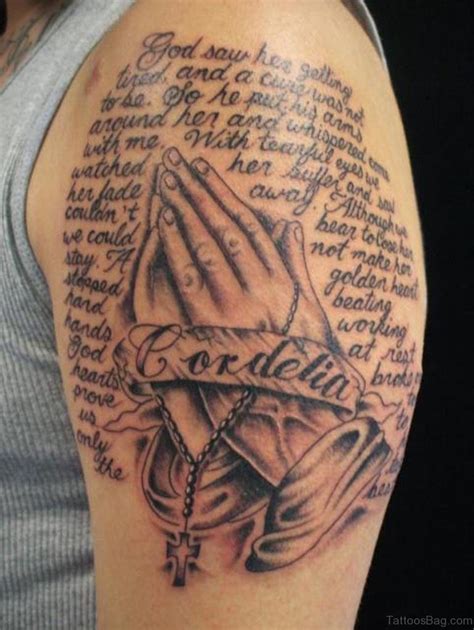 50 outstanding praying hands tattoos on shoulder