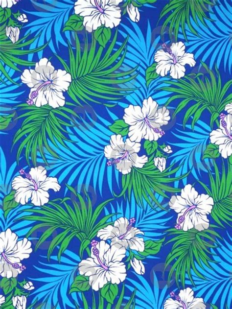 A Blue And White Flower Pattern With Palm Leaves