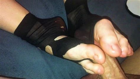amateur footjob 44 ripped black nylon socks ballbusting