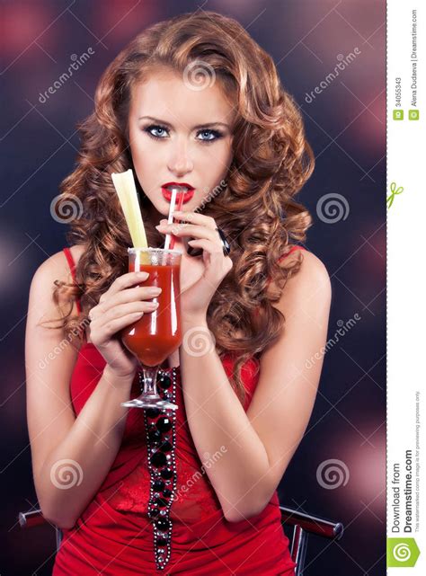 beautiful red haired girl in a red cocktail dress stock image image of juice female 34055343