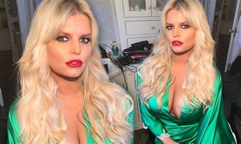 jessica simpson puts on a busty display in silky robe