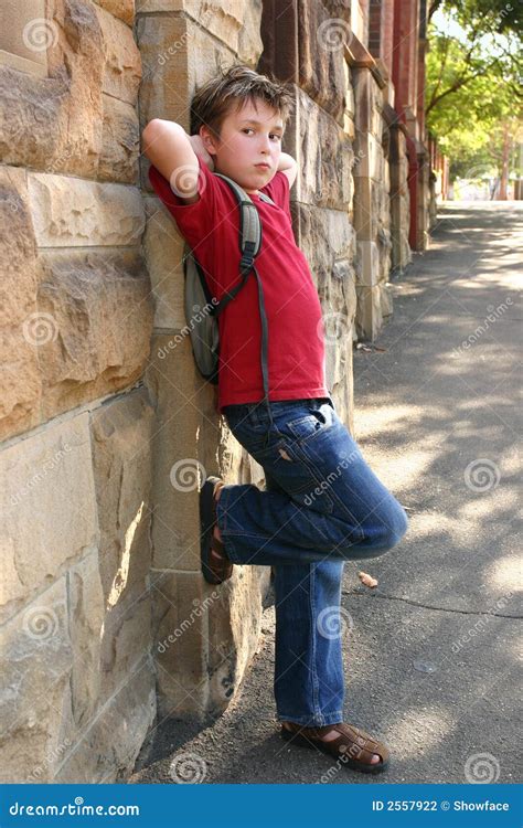 child leaning  wall stock photo image  structure
