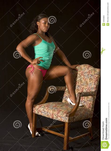 African American Girl By Chair Stock Image Image Of Legs