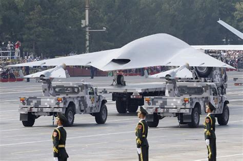 chinas  hyped stealth drone sharp sword launches swarming decoys  enemy warships