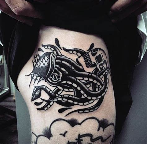 Simple Homemade Like Black Ink Squid With Skull Tattoo On Thigh