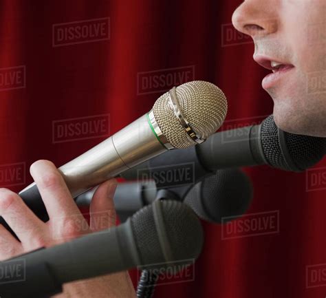 man speaking  microphone stock photo dissolve