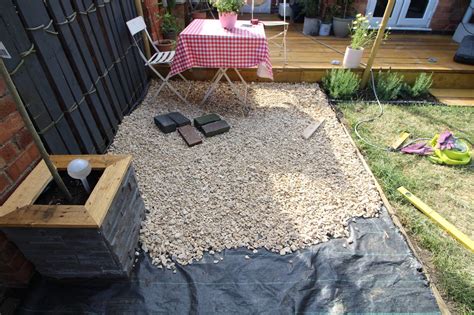 laying gravel   garden kezzabeth diy renovation blog