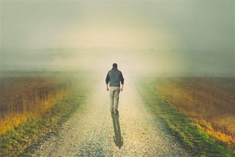 man walking   light   dirt road blue ridge christian news