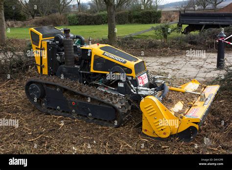 mcconnell robocut remotely controlled tracked mower  clearing scrub stock photo alamy