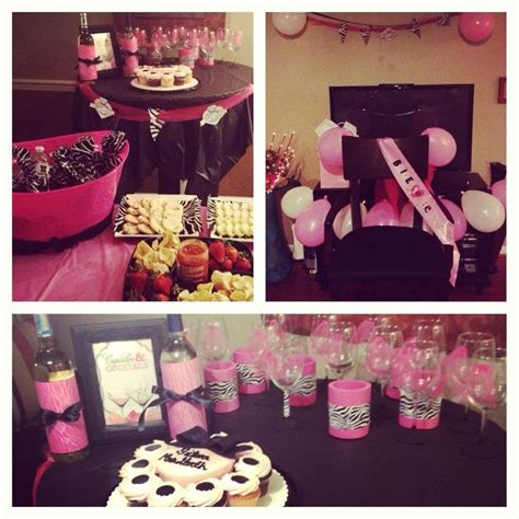pink and black dessert table with zebra print decorations wine glasses