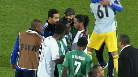 video watch brazil legend ronaldinho get mobbed by opposition players