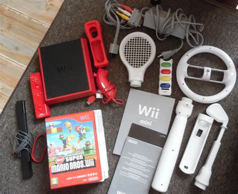 wii mini including  wii games  super mario bros wii sports