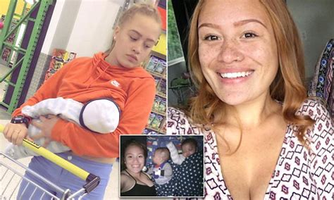 woman breastfeeds as she pushes trolley in new zealand daily mail online