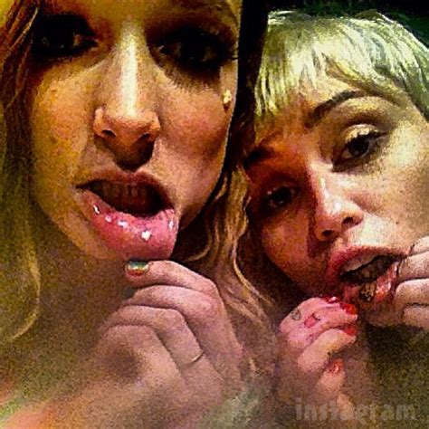 miley cyrus lip tattoo photos plus she rolls a joint with wayne coyne