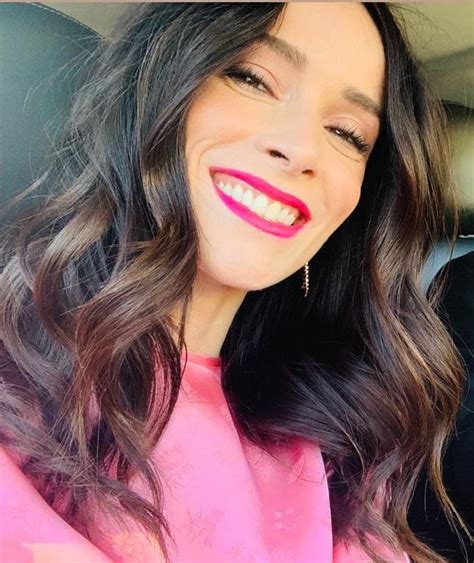 stunning abigail spencer glowing selfie in pink and bright