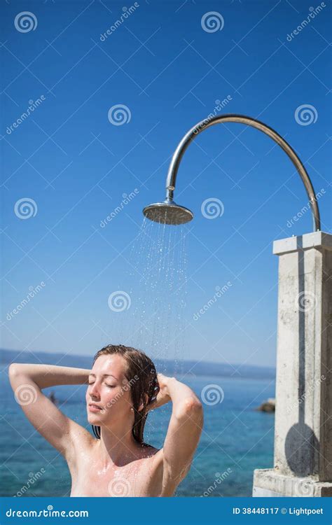 Pretty Young Woman Woman Under Shower On The Beach Stock Image Image