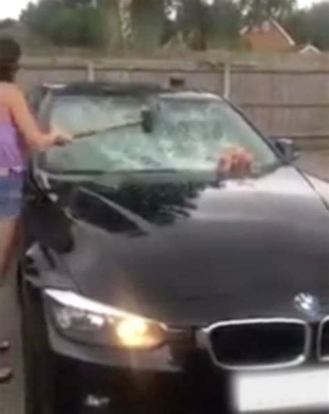 Scorned Woman Smashes Up Cheating Husbands Bmw And Threatens To