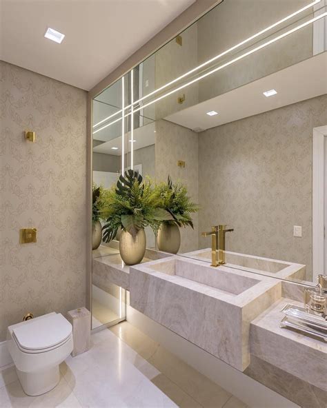 lavabo super chic clean  atemporal  metais em acabamento gold valorizando  decoracion