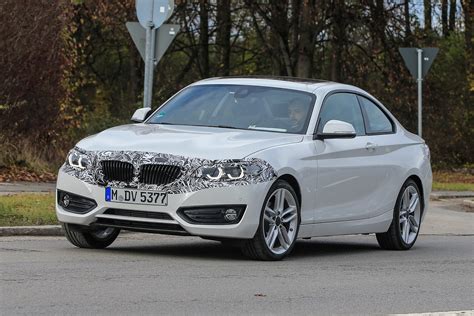 bmw  series spied  minor design tweaks auto express