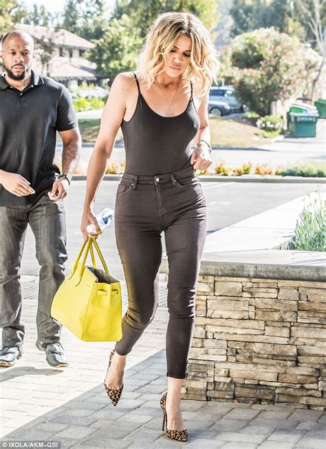 braless khloe kardashian shows off perky assets in a