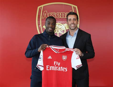 [photos] nicolas pepe poses in arsenal shirt after completing record £