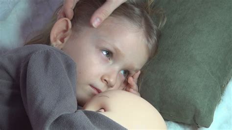 mom comforts his son who was crying stock footage video