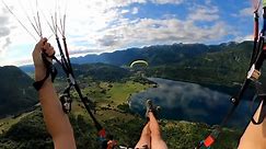 Person Goes for Paragliding Near Lake Bohinj in Slovenia
