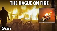 Riots erupt in The Hague with protesters torching cars and clashing with cops