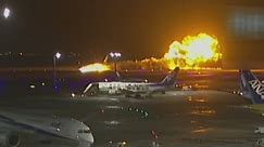 Plane catches fire on runway in Japan