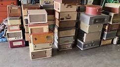 Huge collection of portable vintage record players Over 100 Old record players