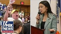AOC heckled, booed at NYC town hall