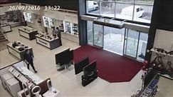 That awkward moment when a clumsy customer knocks over 4 big-screen TVs