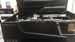 How to open and clean a HP Officejet 6700 premium all in one ink jet printer.