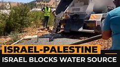 Israeli army pours cement into Palestinian water source