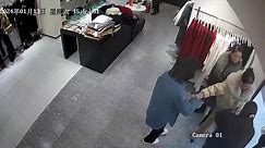 Chinese women brazenly snatch hangers in daring clothing store theft