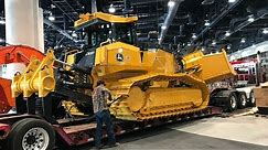 The World's largest bulldozer with a six way blade moving out of Conexpo 2017