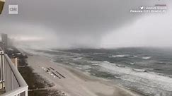 Watch a huge waterspout loom over Panama City Beach